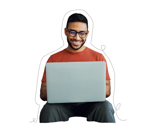 Man sitting and looking at computer